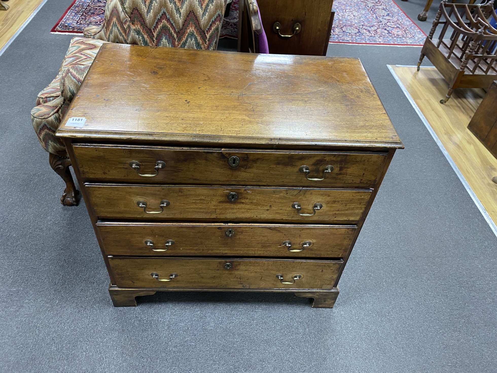 A small George III mahogany chest of four drawers, width 84cm, depth 45cm, height 82cm